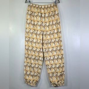 TORY BURCH BASKETWEAVE EMBROIDERED ANKLE PANTS.